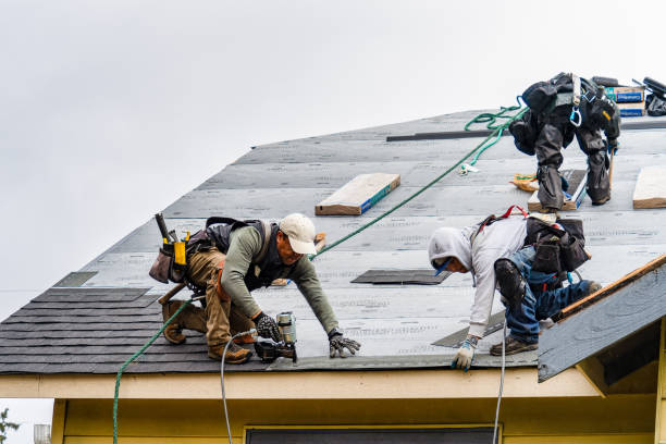 Professional Gutter Installation technician working in Riverside, MD